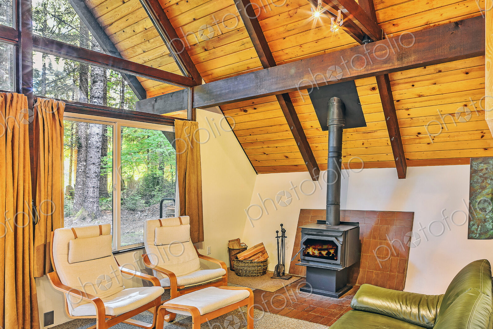 Fireplace and armchairs in rustic living room