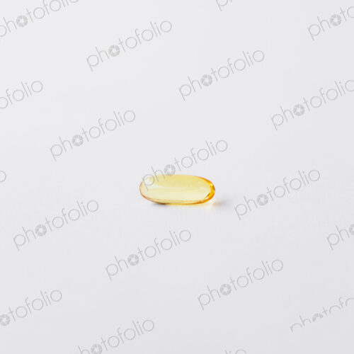 Fish oil providing Omega-3, in a softgel supplement capsule, a health supplement and… Fish oil providing Omega-3, in a softgel supplement capsule, a health supplement and…
