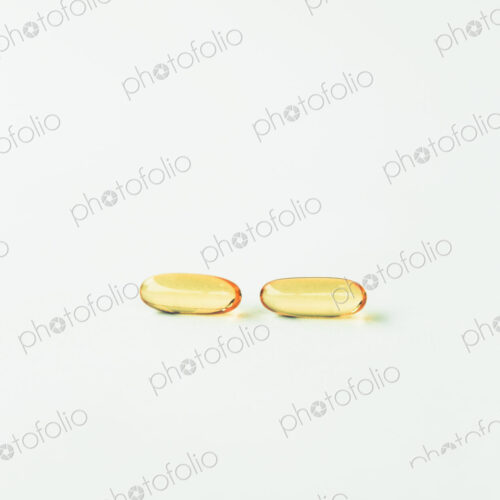 Fish oil providing Omega-3, in softgel supplement capsules, a health supplement and… Fish oil providing Omega-3, in softgel supplement capsules, a health supplement and…