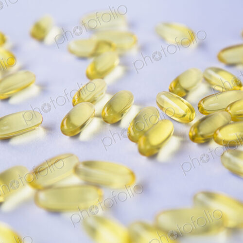 Fish oil providing Omega-3, in softgel supplement capsules. An essential fatty acid… Fish oil providing Omega-3, in softgel supplement capsules. An essential fatty acid…