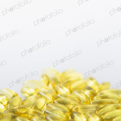 Fish oil providing Omega-3, in softgel supplement capsules. An essential fatty acid… Fish oil providing Omega-3, in softgel supplement capsules. An essential fatty acid…