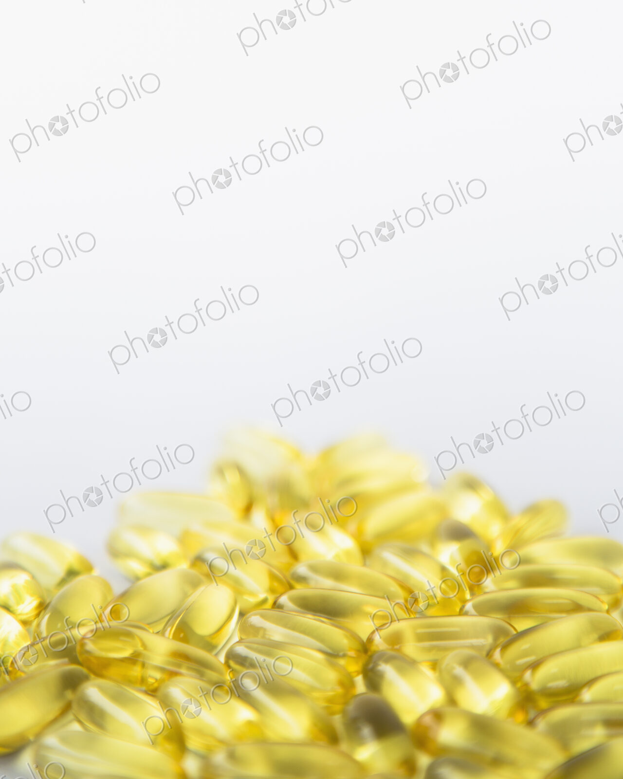 Fish oil providing Omega-3, in softgel supplement capsules. An essential fatty acid…