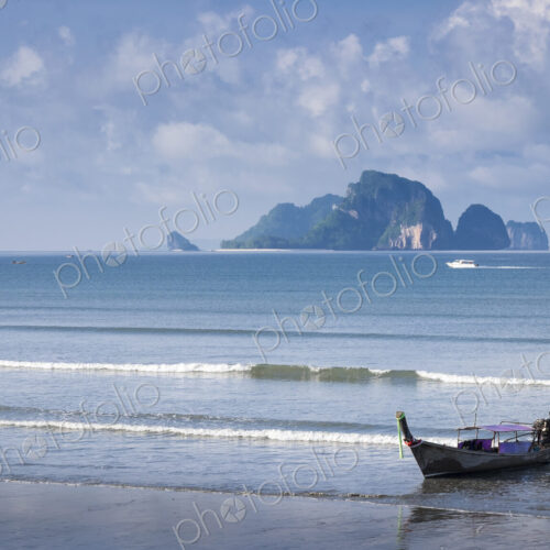 Fishing boat moored on beach