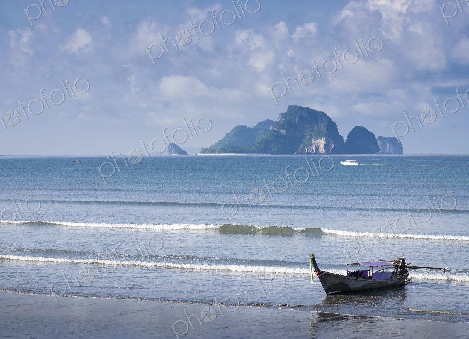 Fishing boat moored on beach