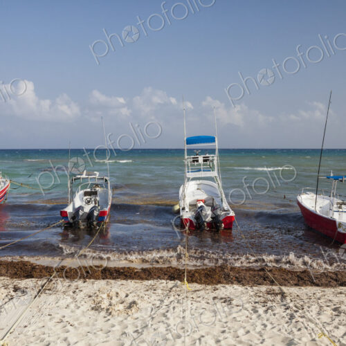 Fishing boats anchored on the beach Fishing boats anchored on the beach