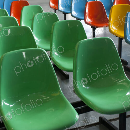 Fixed seats on a metal framework, plastic coloured shapes. Red, green, blue and yellow. Fixed seats on a metal framework, plastic coloured shapes. Red, green, blue and yellow.