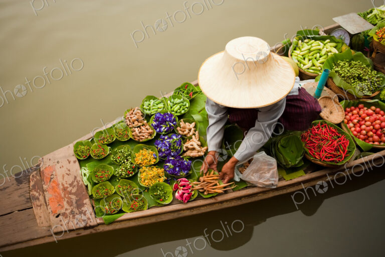 Floating markets are a common tradition throughout Southeast Asia. Bangkok, Thailand.