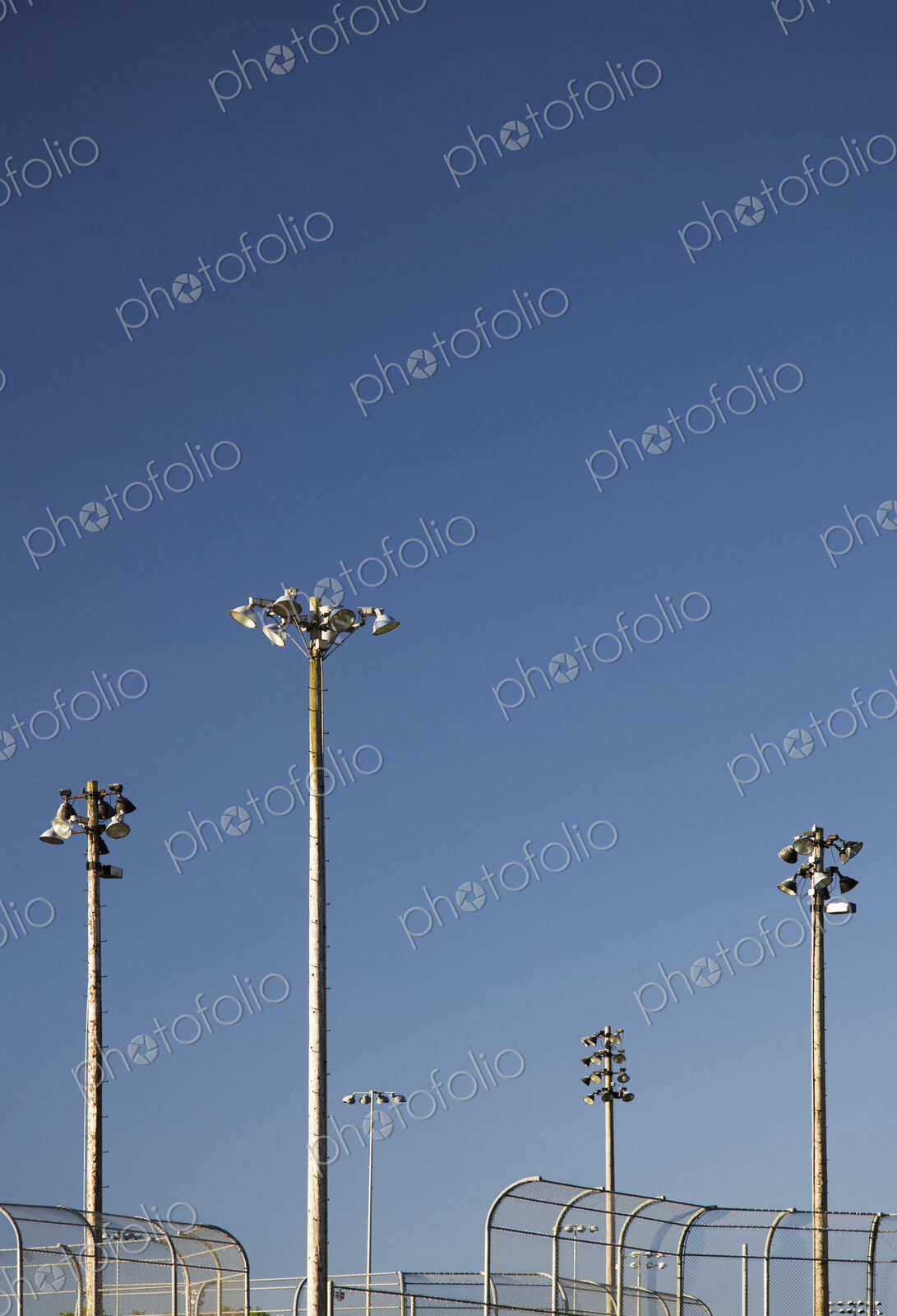 Floodlights Above Baseball Backstops