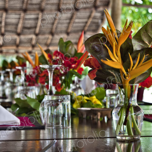Flowers On Open Air Restaurant Dining Table Flowers On Open Air Restaurant Dining Table