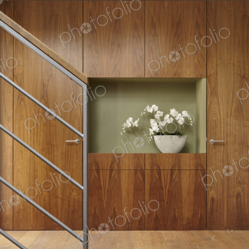 Flowers and walnut wall covering in home Flowers and walnut wall covering in home