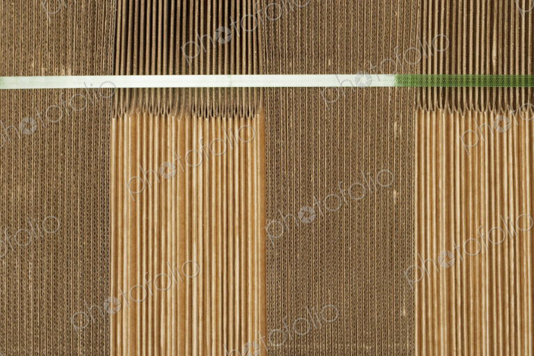 Folded flat cardboard boxes.