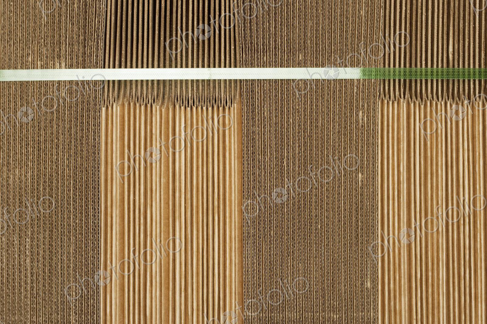 Folded flat cardboard boxes.