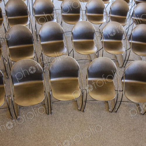 Folding chairs lined up for a business meeting Folding chairs lined up for a business meeting