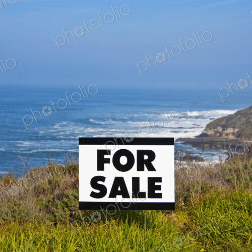 For Sale Sign Near Beach