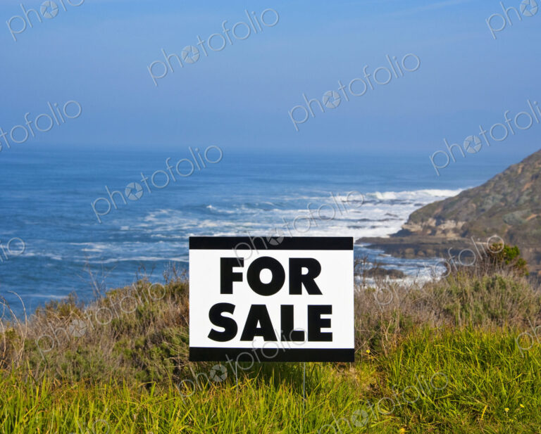 For Sale Sign Near Beach