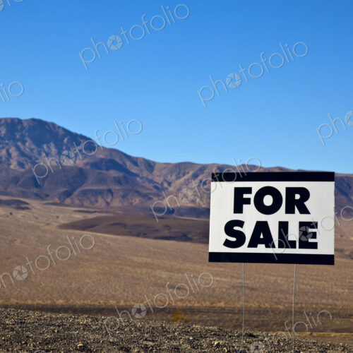 For Sale Sign in Desert For Sale Sign in Desert