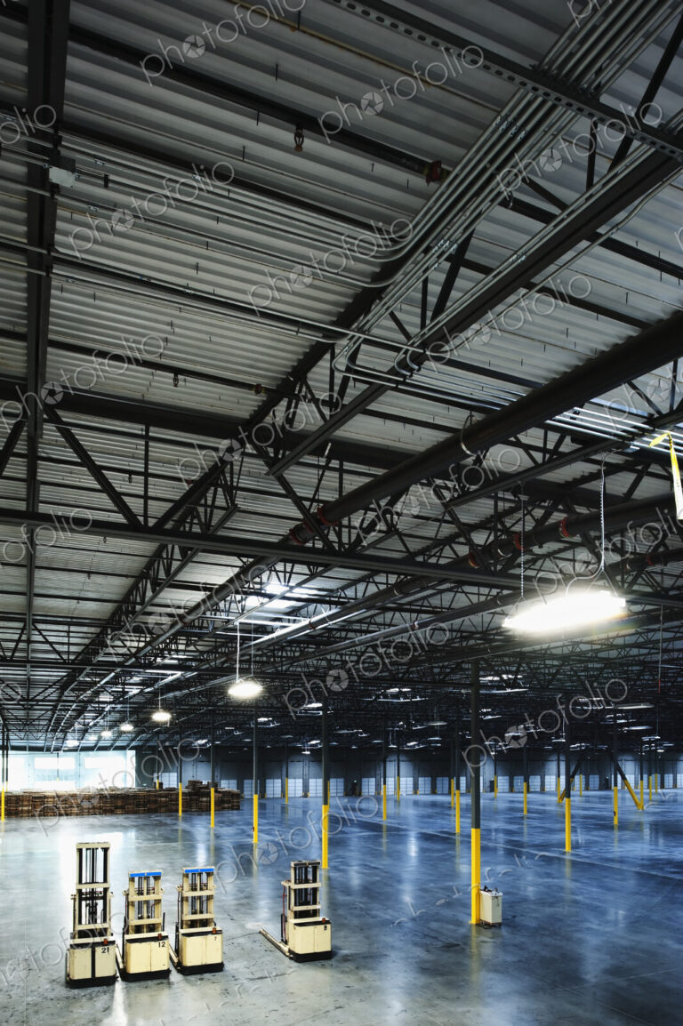 Forklifts in warehouse