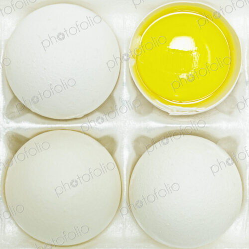 Four Eggs With One Cut Open Four Eggs With One Cut Open