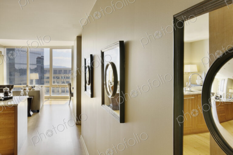 Framed Mirrors on Wall of Upscale Home Interior
