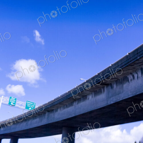 Freeway overpass, low angle view of the flyover against a blue sky, Seattle, WA, USA