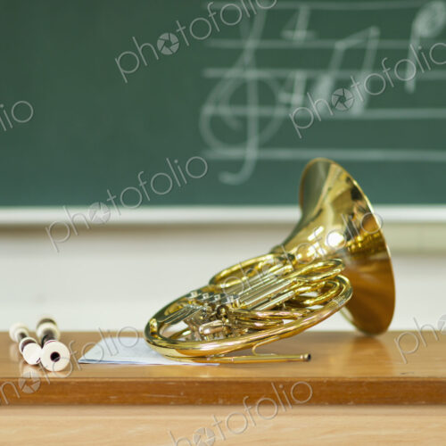 French horn sitting on desk in classroom French horn sitting on desk in classroom