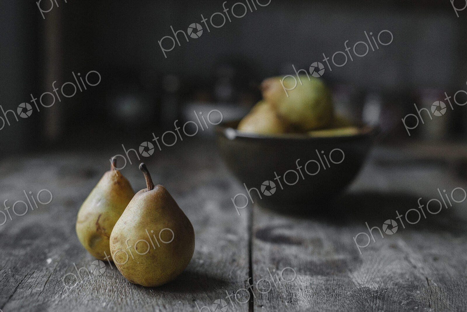 Fresh pears on a kitchen table.