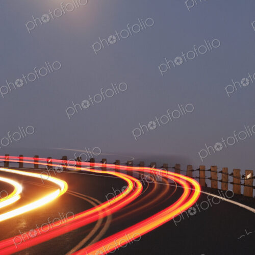 Full Moon Over a Curving Road