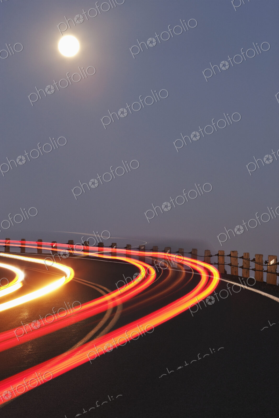 Full Moon Over a Curving Road