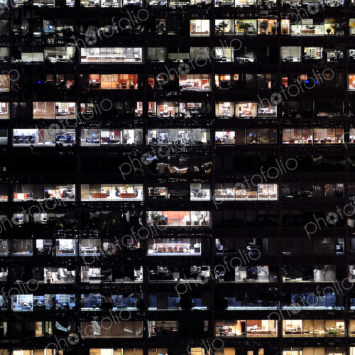 Full frame of highrise building windows at night Full frame of highrise building windows at night