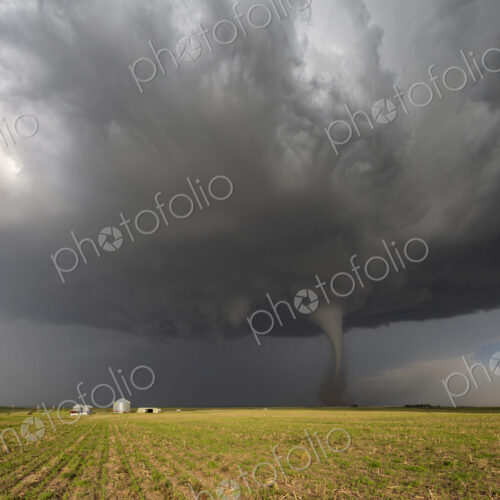 Fully Condensed Tornado, a rotating column of air reaching to the ground, a defined shape. Fully Condensed Tornado, a rotating column of air reaching to the ground, a defined shape.