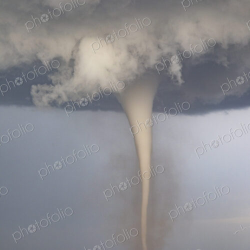 Fully Condensed Tornado, a rotating column of air reaching to the ground, a defined shape. Fully Condensed Tornado, a rotating column of air reaching to the ground, a defined shape.
