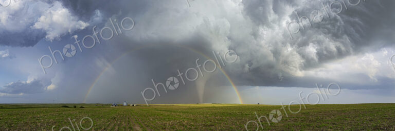 Fully Condensed Tornado with a Double Rainbow
