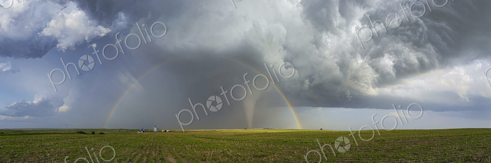 Fully Condensed Tornado with a Double Rainbow