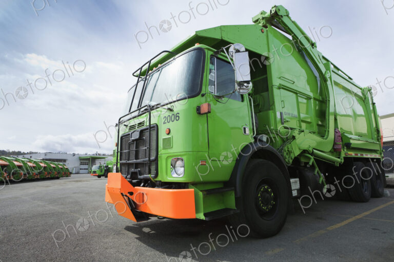 Garbage Truck Parked In A Parking Lot