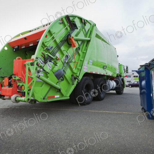Garbage Truck Parked In A Parking Lot Garbage Truck Parked In A Parking Lot