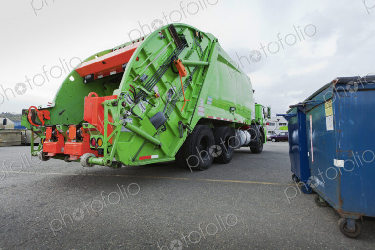 Garbage Truck Parked In A Parking Lot