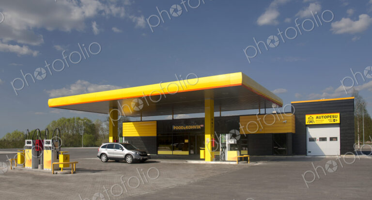 Gas station, petrol station on a road at dusk.