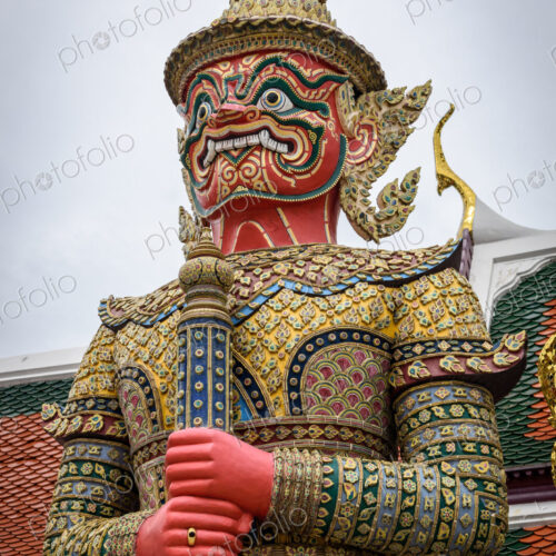 Giant guardian statues at Wat Phra Kaew. Giant guardian statues at Wat Phra Kaew.