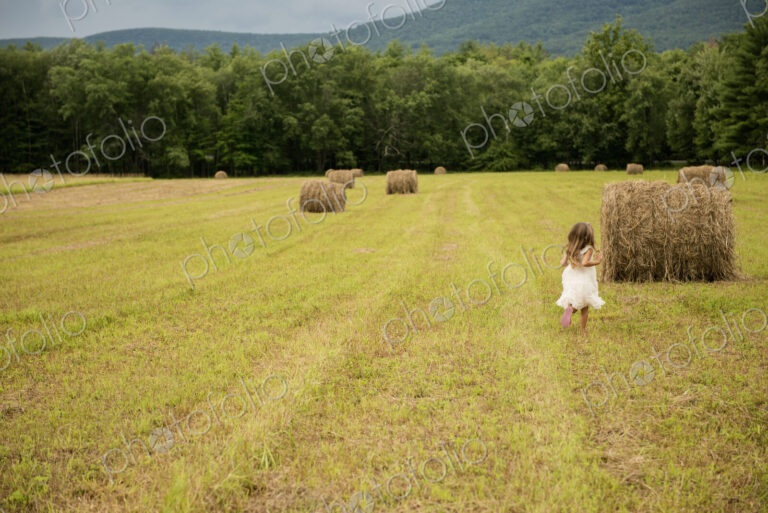 Girl playing outdoors.