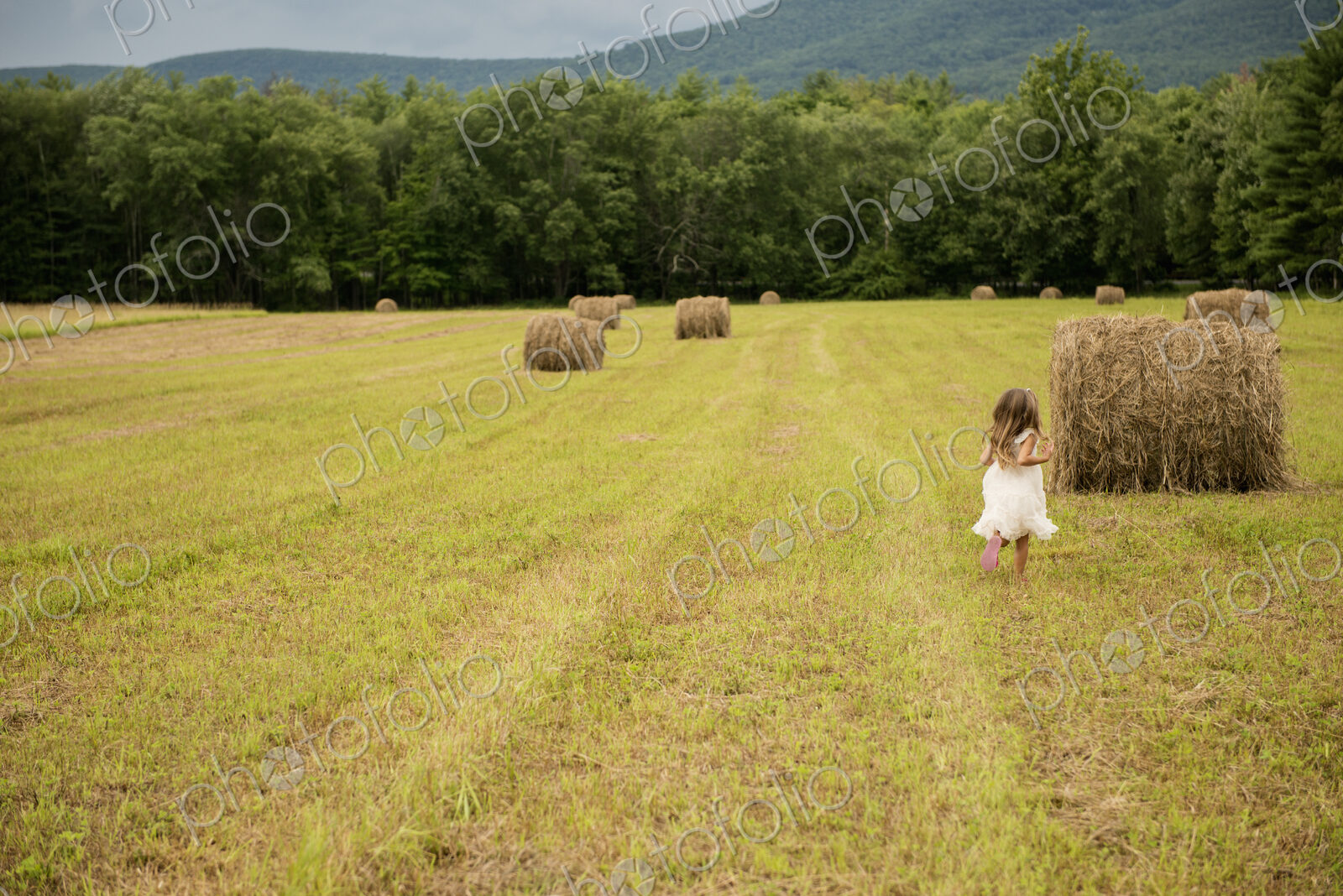 Girl playing outdoors.