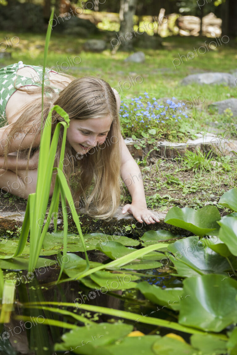 Girl playing outdoors.