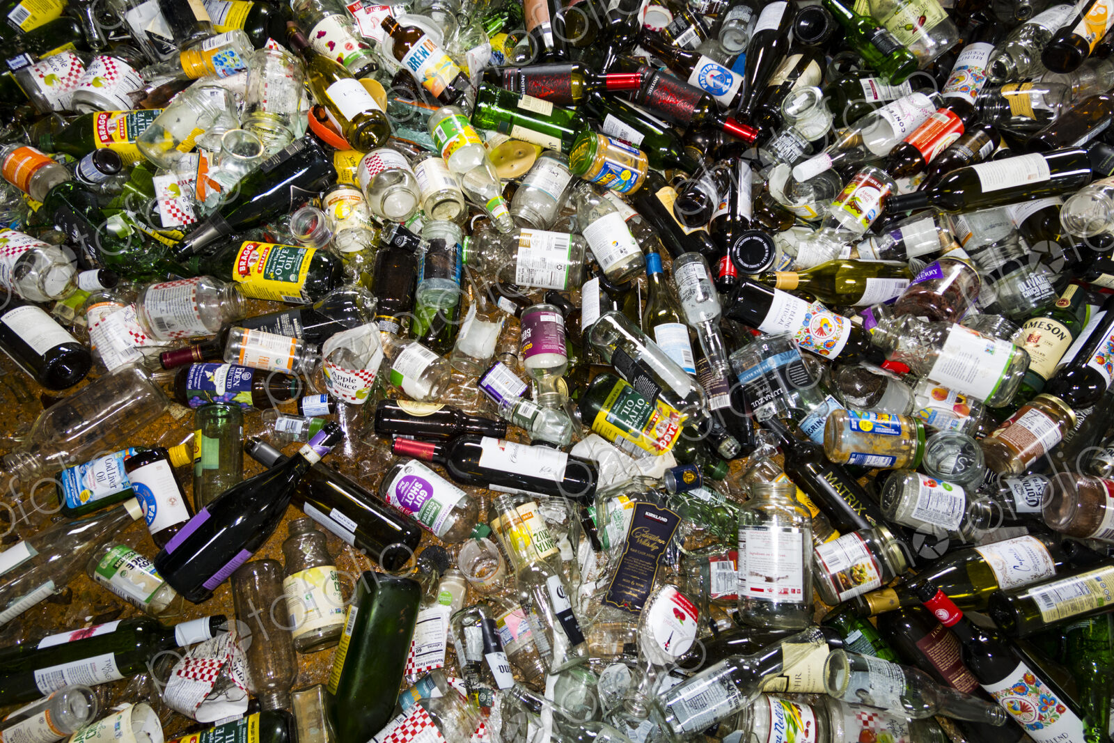 Glass bottles and containers in recycling bin, Port Angeles, WA USA