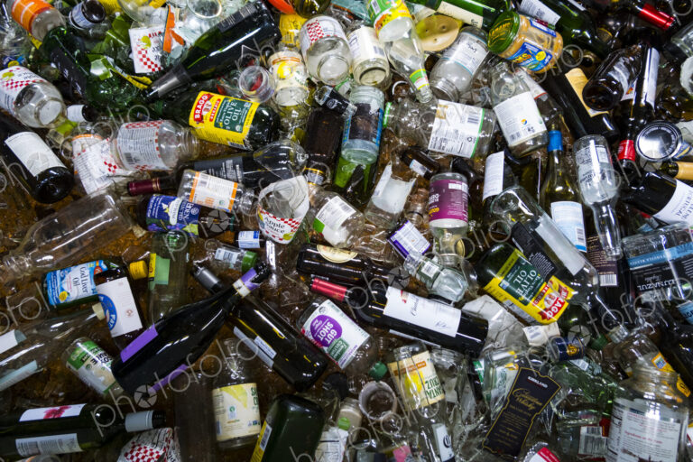 Glass bottles and containers in recycling bin, Port Angeles, WA USA