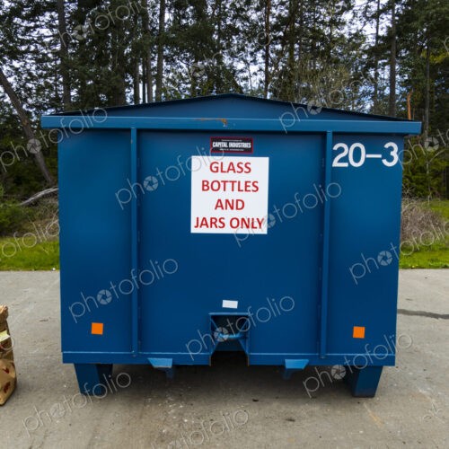 Glass bottles and containers in recycling bin, Port Angeles, WA USA Glass bottles and containers in recycling bin, Port Angeles, WA USA