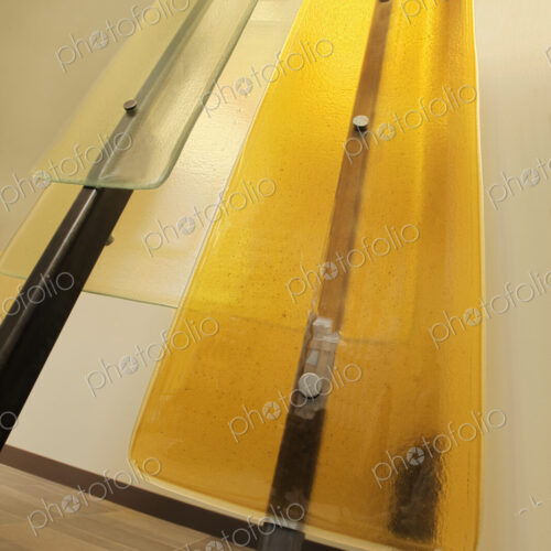 Glass panels on metal frame.
