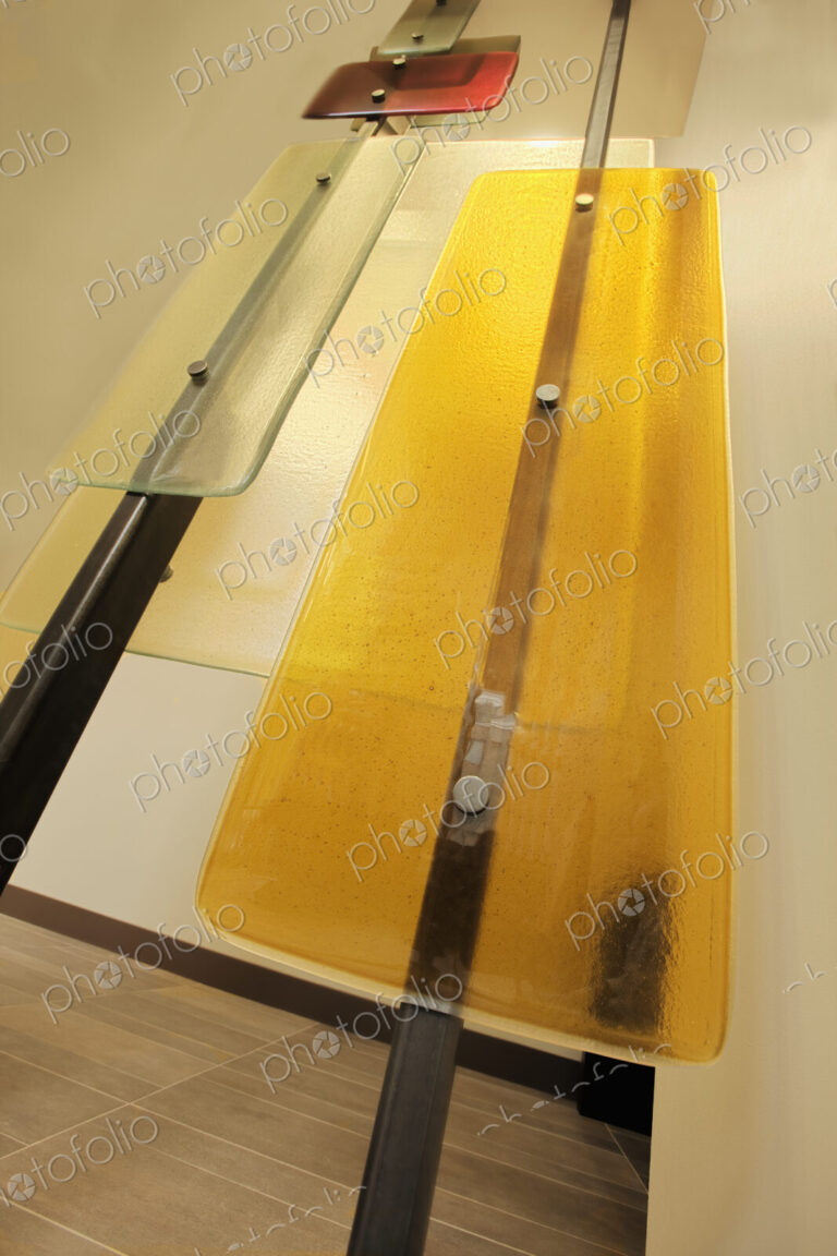 Glass panels on metal frame.