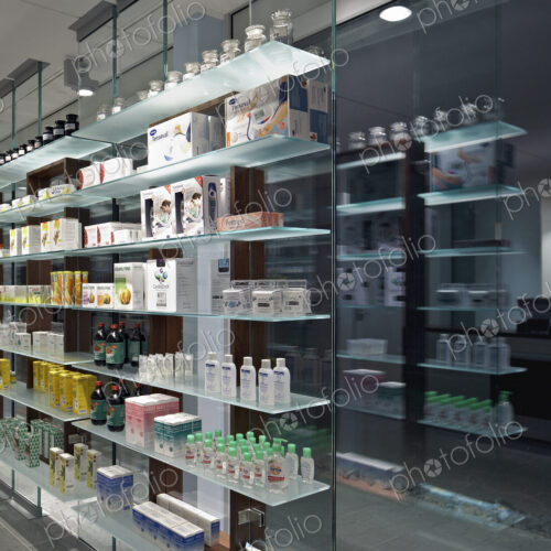 Glass shelves and windows in modern pharmacy