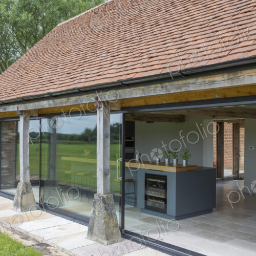 Glass sliding doors of converted barn home Glass sliding doors of converted barn home