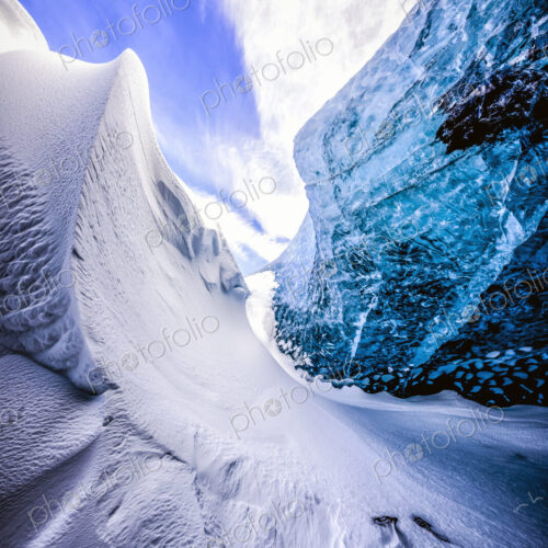 Glass wall of snowy ice cave