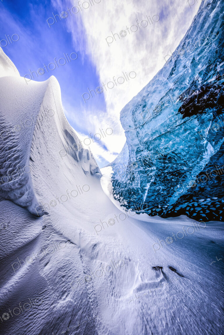 Glass wall of snowy ice cave